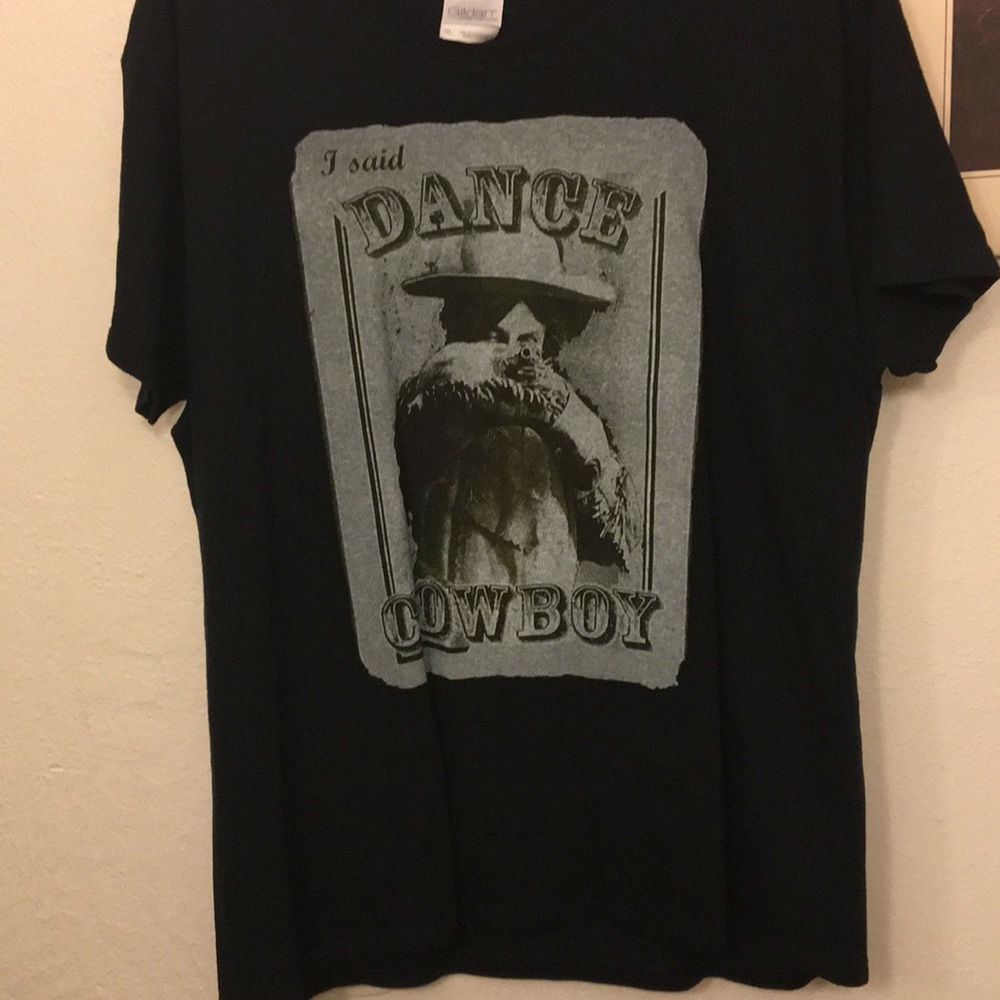 I said dance cowboy T-shirt.